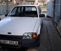 Белый Форд Эскорт, объемом двигателя 1.3 л и пробегом 100 тыс. км за 1000 $, фото 1 на Automoto.ua