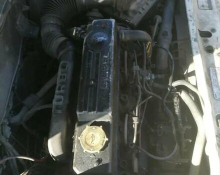 Белый Форд Эскорт, объемом двигателя 1.8 л и пробегом 300 тыс. км за 600 $, фото 1 на Automoto.ua