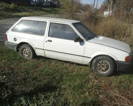 Белый Форд Эскорт, объемом двигателя 1.8 л и пробегом 300 тыс. км за 600 $, фото 3 на Automoto.ua