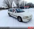 Белый Форд Эскорт, объемом двигателя 1.8 л и пробегом 283 тыс. км за 1250 $, фото 1 на Automoto.ua