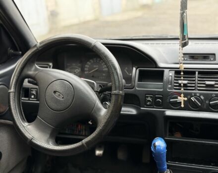 Білий Форд Ескорт, об'ємом двигуна 1.4 л та пробігом 250 тис. км за 750 $, фото 8 на Automoto.ua