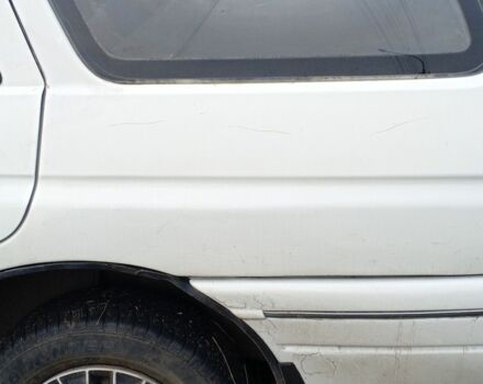 Белый Форд Эскорт, объемом двигателя 1.8 л и пробегом 250 тыс. км за 1500 $, фото 5 на Automoto.ua