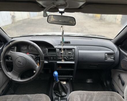 Білий Форд Ескорт, об'ємом двигуна 1.4 л та пробігом 250 тис. км за 750 $, фото 9 на Automoto.ua