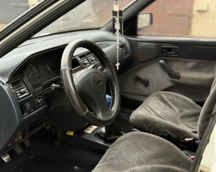 Білий Форд Ескорт, об'ємом двигуна 1.4 л та пробігом 250 тис. км за 750 $, фото 7 на Automoto.ua