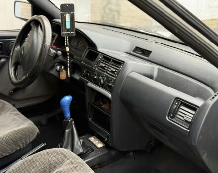 Білий Форд Ескорт, об'ємом двигуна 1.4 л та пробігом 250 тис. км за 750 $, фото 13 на Automoto.ua