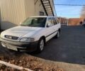 Белый Форд Эскорт, объемом двигателя 1.6 л и пробегом 230 тыс. км за 2300 $, фото 1 на Automoto.ua