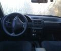 Белый Форд Эскорт, объемом двигателя 1.8 л и пробегом 396 тыс. км за 1600 $, фото 5 на Automoto.ua