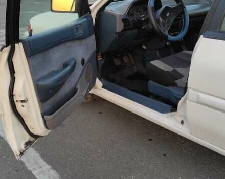 Белый Форд Эскорт, объемом двигателя 1.9 л и пробегом 259 тыс. км за 1500 $, фото 9 на Automoto.ua