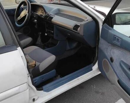 Белый Форд Эскорт, объемом двигателя 1.9 л и пробегом 259 тыс. км за 1500 $, фото 12 на Automoto.ua