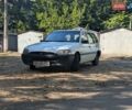 Белый Форд Эскорт, объемом двигателя 1.4 л и пробегом 350 тыс. км за 1350 $, фото 1 на Automoto.ua
