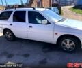 Белый Форд Эскорт, объемом двигателя 1.3 л и пробегом 200 тыс. км за 990 $, фото 1 на Automoto.ua