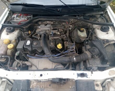 Белый Форд Эскорт, объемом двигателя 1.4 л и пробегом 373 тыс. км за 1350 $, фото 5 на Automoto.ua