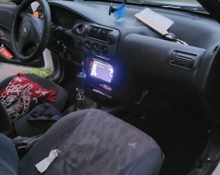 Белый Форд Эскорт, объемом двигателя 1.4 л и пробегом 257 тыс. км за 1400 $, фото 3 на Automoto.ua