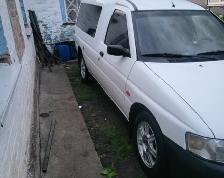 Белый Форд Эскорт, объемом двигателя 1.4 л и пробегом 257 тыс. км за 1400 $, фото 6 на Automoto.ua