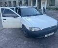 Белый Форд Эскорт, объемом двигателя 1.3 л и пробегом 300 тыс. км за 1100 $, фото 1 на Automoto.ua
