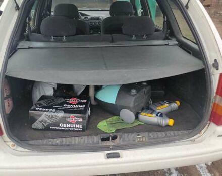 Білий Форд Ескорт, об'ємом двигуна 1.8 л та пробігом 300 тис. км за 700 $, фото 9 на Automoto.ua