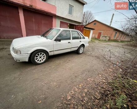 Белый Форд Эскорт, объемом двигателя 1.8 л и пробегом 150 тыс. км за 550 $, фото 2 на Automoto.ua