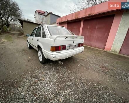 Белый Форд Эскорт, объемом двигателя 1.8 л и пробегом 150 тыс. км за 550 $, фото 3 на Automoto.ua
