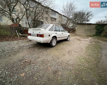 Белый Форд Эскорт, объемом двигателя 1.8 л и пробегом 150 тыс. км за 550 $, фото 5 на Automoto.ua