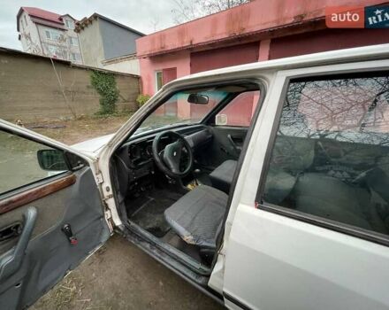 Белый Форд Эскорт, объемом двигателя 1.8 л и пробегом 150 тыс. км за 550 $, фото 7 на Automoto.ua