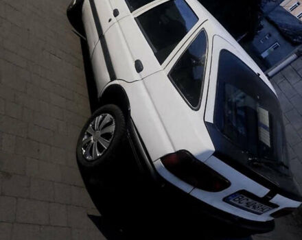 Белый Форд Эскорт, объемом двигателя 1.3 л и пробегом 300 тыс. км за 900 $, фото 1 на Automoto.ua