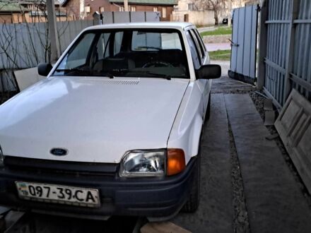Белый Форд Эскорт, объемом двигателя 1.3 л и пробегом 100 тыс. км за 1000 $, фото 1 на Automoto.ua