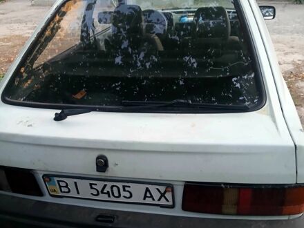 Белый Форд Эскорт, объемом двигателя 1.3 л и пробегом 3 тыс. км за 861 $, фото 1 на Automoto.ua