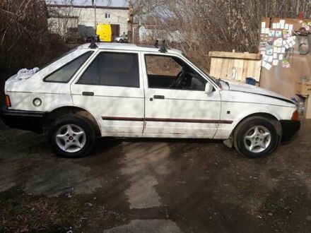 Белый Форд Эскорт, объемом двигателя 1.4 л и пробегом 400 тыс. км за 591 $, фото 1 на Automoto.ua