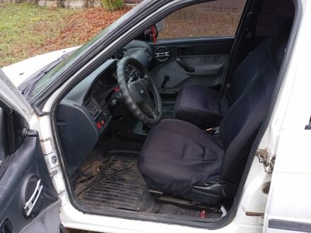 Форд Эскорт 1992 в Борисполе на Automoto.ua Белый Форд Эскорт, объемом двигателя 1.8 л и пробегом 84 тыс. км за 1400 $, фото 1 на Automoto.ua