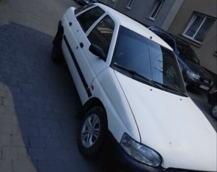 Белый Форд Эскорт, объемом двигателя 1.3 л и пробегом 200 тыс. км за 946 $, фото 1 на Automoto.ua