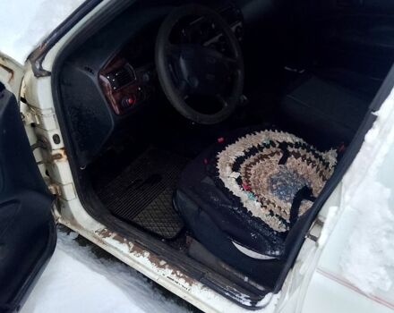 Белый Форд Эскорт, объемом двигателя 1.4 л и пробегом 203 тыс. км за 1000 $, фото 1 на Automoto.ua