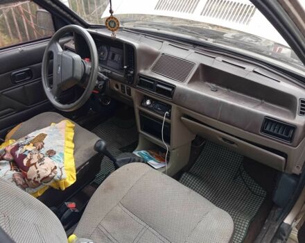 Бежевый Форд Эскорт, объемом двигателя 1.4 л и пробегом 189 тыс. км за 500 $, фото 5 на Automoto.ua