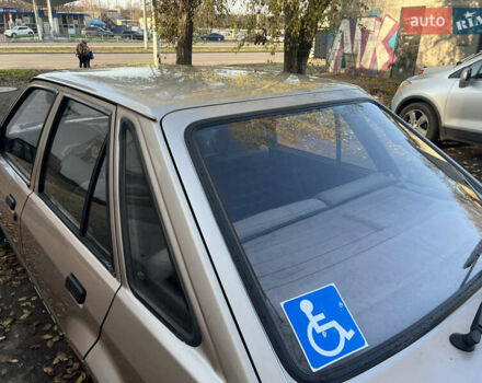 Бежевий Форд Ескорт, об'ємом двигуна 1.4 л та пробігом 150 тис. км за 880 $, фото 5 на Automoto.ua