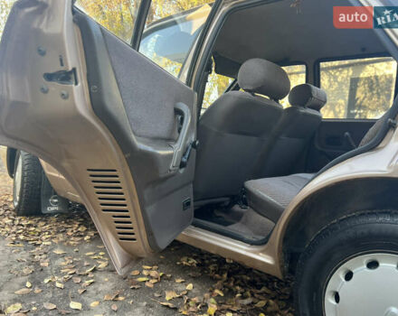 Бежевий Форд Ескорт, об'ємом двигуна 1.4 л та пробігом 150 тис. км за 880 $, фото 15 на Automoto.ua