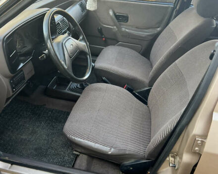 Бежевий Форд Ескорт, об'ємом двигуна 1.4 л та пробігом 150 тис. км за 880 $, фото 14 на Automoto.ua