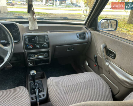 Бежевий Форд Ескорт, об'ємом двигуна 1.4 л та пробігом 150 тис. км за 880 $, фото 19 на Automoto.ua