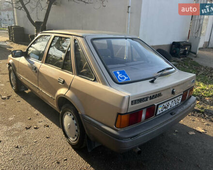Бежевий Форд Ескорт, об'ємом двигуна 1.4 л та пробігом 150 тис. км за 880 $, фото 7 на Automoto.ua