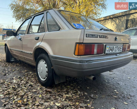 Бежевий Форд Ескорт, об'ємом двигуна 1.4 л та пробігом 150 тис. км за 880 $, фото 8 на Automoto.ua