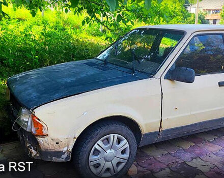 Бежевий Форд Ескорт, об'ємом двигуна 1.3 л та пробігом 123 тис. км за 150 $, фото 1 на Automoto.ua