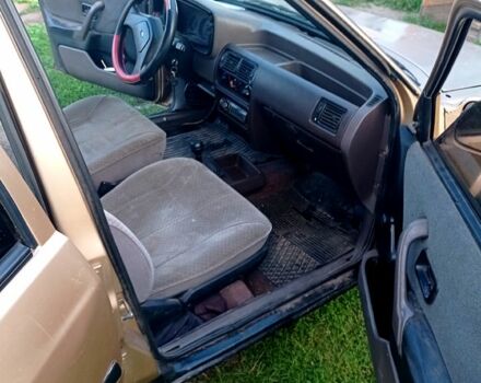 Бежевий Форд Ескорт, об'ємом двигуна 1.3 л та пробігом 0 тис. км за 850 $, фото 1 на Automoto.ua