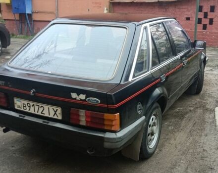 Черный Форд Эскорт, объемом двигателя 1.3 л и пробегом 200 тыс. км за 593 $, фото 2 на Automoto.ua