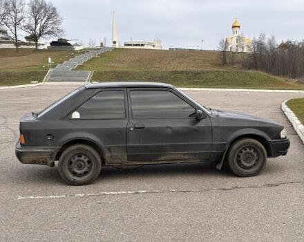 Черный Форд Эскорт, объемом двигателя 1.3 л и пробегом 300 тыс. км за 1000 $, фото 2 на Automoto.ua