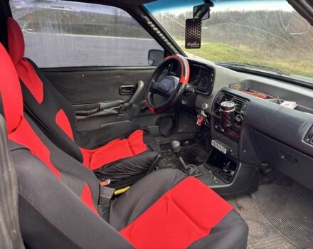 Черный Форд Эскорт, объемом двигателя 1.3 л и пробегом 300 тыс. км за 1000 $, фото 3 на Automoto.ua