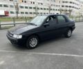 Черный Форд Эскорт, объемом двигателя 1.3 л и пробегом 150 тыс. км за 1200 $, фото 1 на Automoto.ua