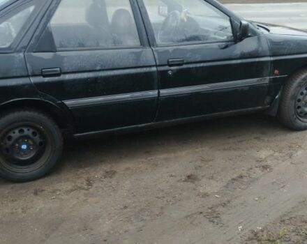 Черный Форд Эскорт, объемом двигателя 1.8 л и пробегом 60 тыс. км за 805 $, фото 2 на Automoto.ua