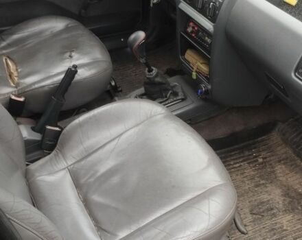 Черный Форд Эскорт, объемом двигателя 1.8 л и пробегом 60 тыс. км за 805 $, фото 5 на Automoto.ua