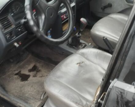 Черный Форд Эскорт, объемом двигателя 1.8 л и пробегом 60 тыс. км за 805 $, фото 4 на Automoto.ua