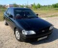 Черный Форд Эскорт, объемом двигателя 1.8 л и пробегом 270 тыс. км за 1200 $, фото 6 на Automoto.ua