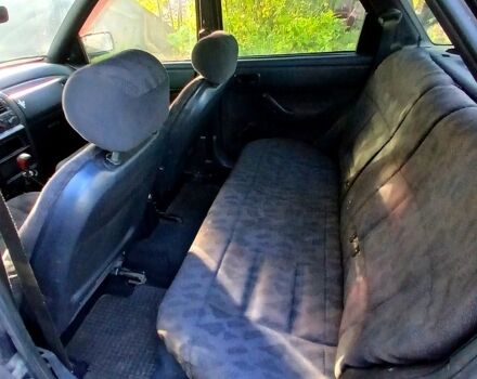 Черный Форд Эскорт, объемом двигателя 1.3 л и пробегом 487 тыс. км за 650 $, фото 5 на Automoto.ua