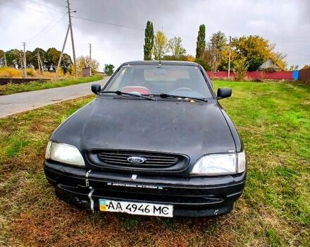Черный Форд Эскорт, объемом двигателя 1.3 л и пробегом 487 тыс. км за 650 $, фото 1 на Automoto.ua